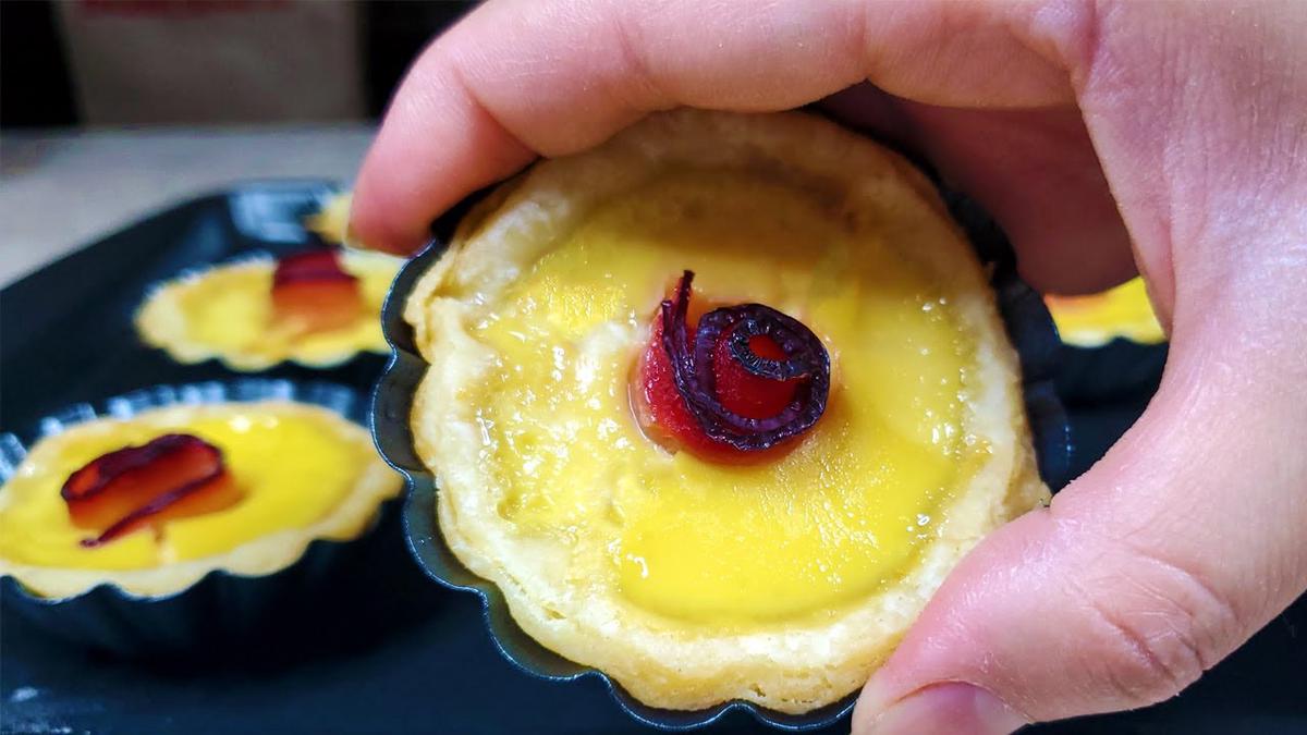 'Video thumbnail for Flaky Puff Pastry Egg Tarts With An Edible Rose. Can you guess what it is?'