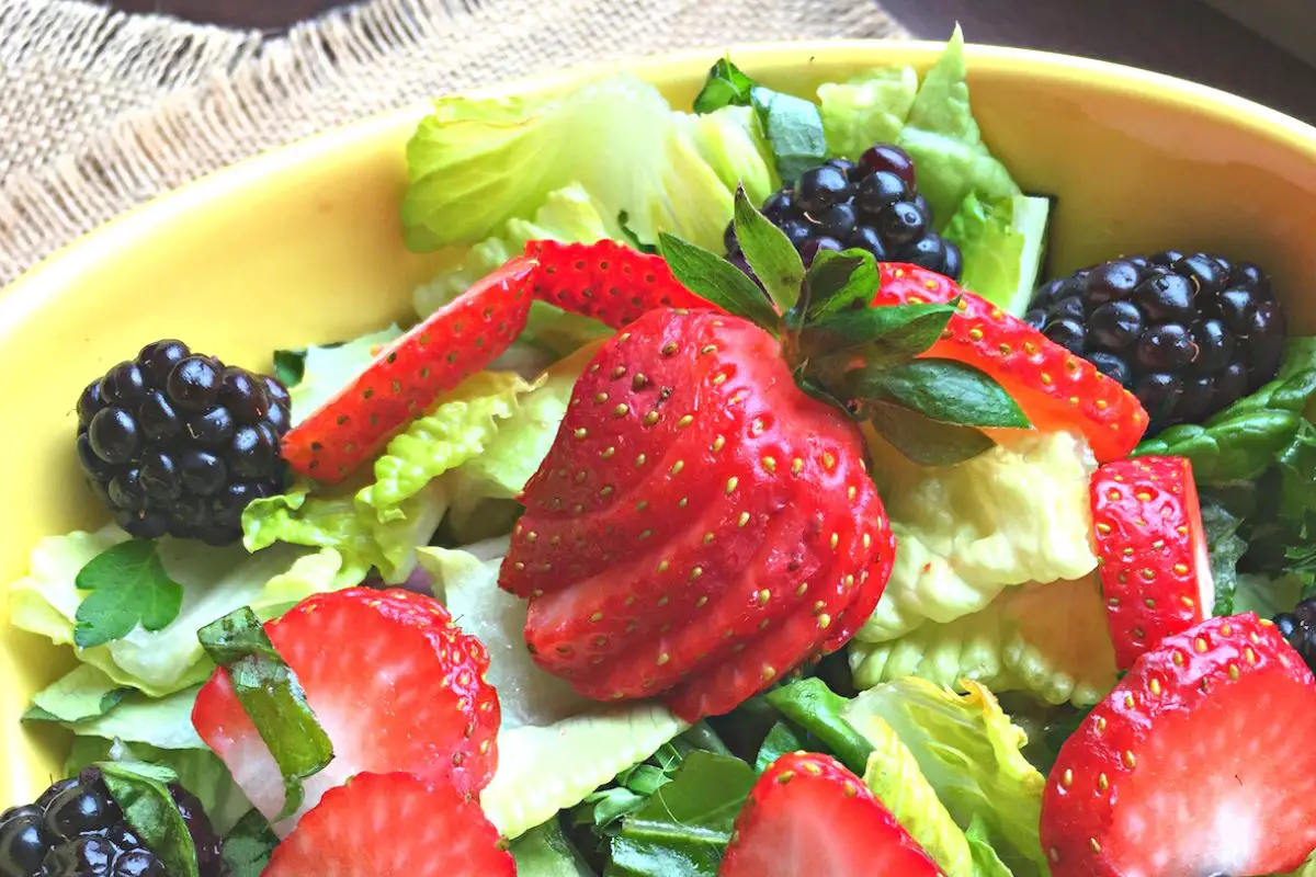 Refreshing Mixed Berry Salad with Raspberry Vinaigrette - wellnesssleuth