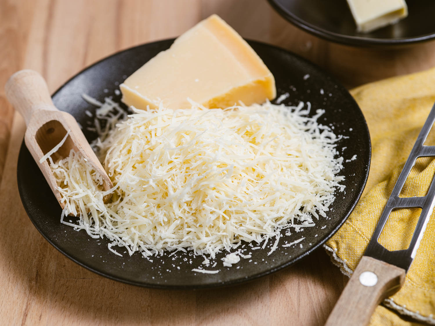 Freshly grated Parmesan cheese prepared for creamy Parmesan polenta.

