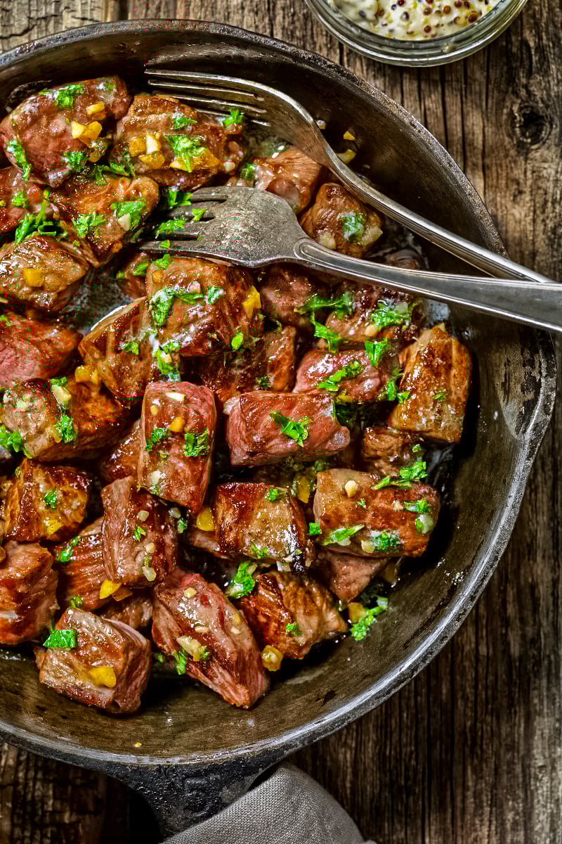 Close-up of seared steak cubes ready to serve