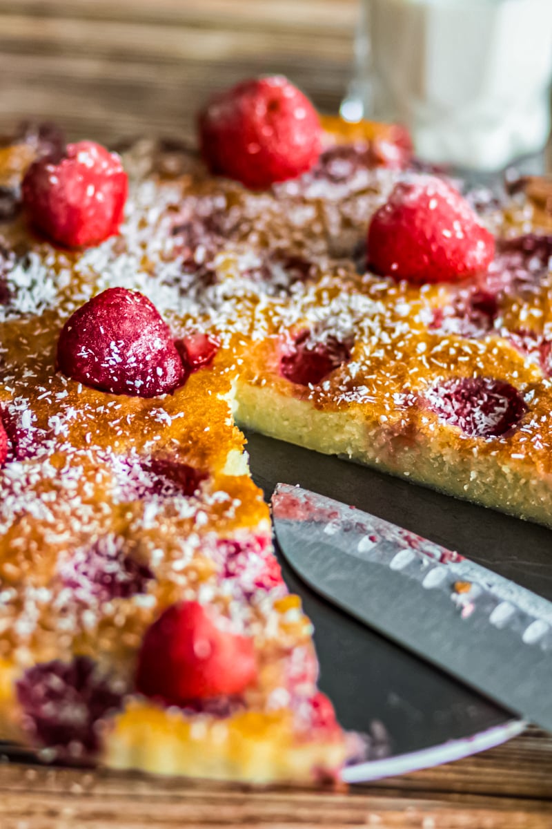 Healthy strawberry cake slice on a plate showing tender crumb