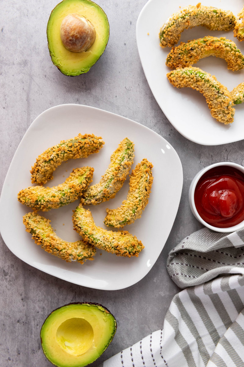 Breaded avocado fries coated with crispy panko breadcrumbs before air frying