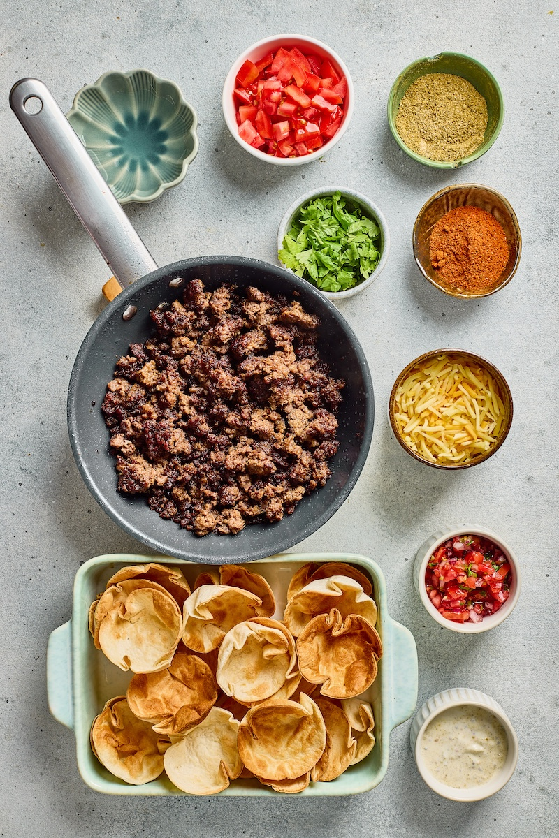 Ground beef browning in a skillet for crispy Taco Ranch Bites.