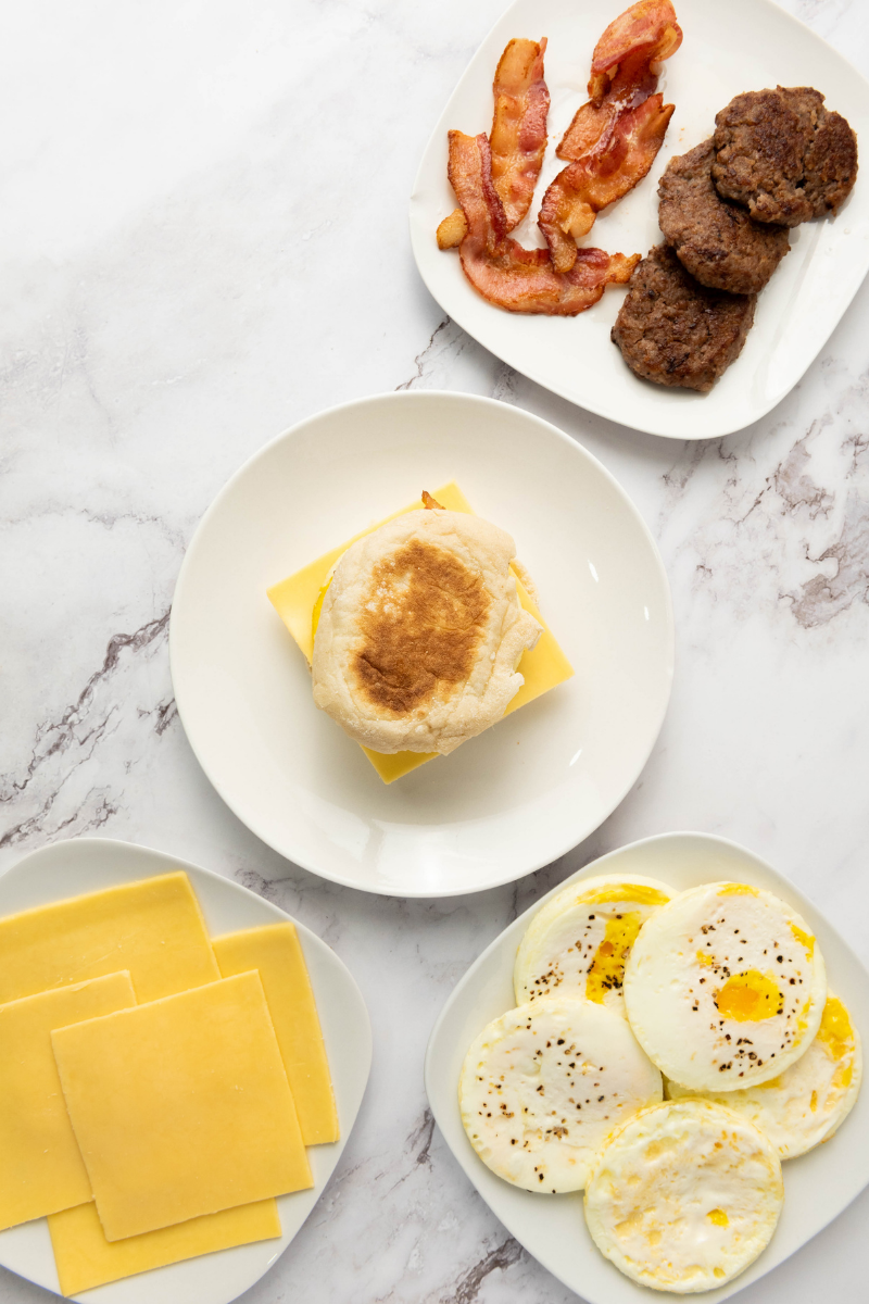Fully assembled bacon, egg, and cheese breakfast sandwich.