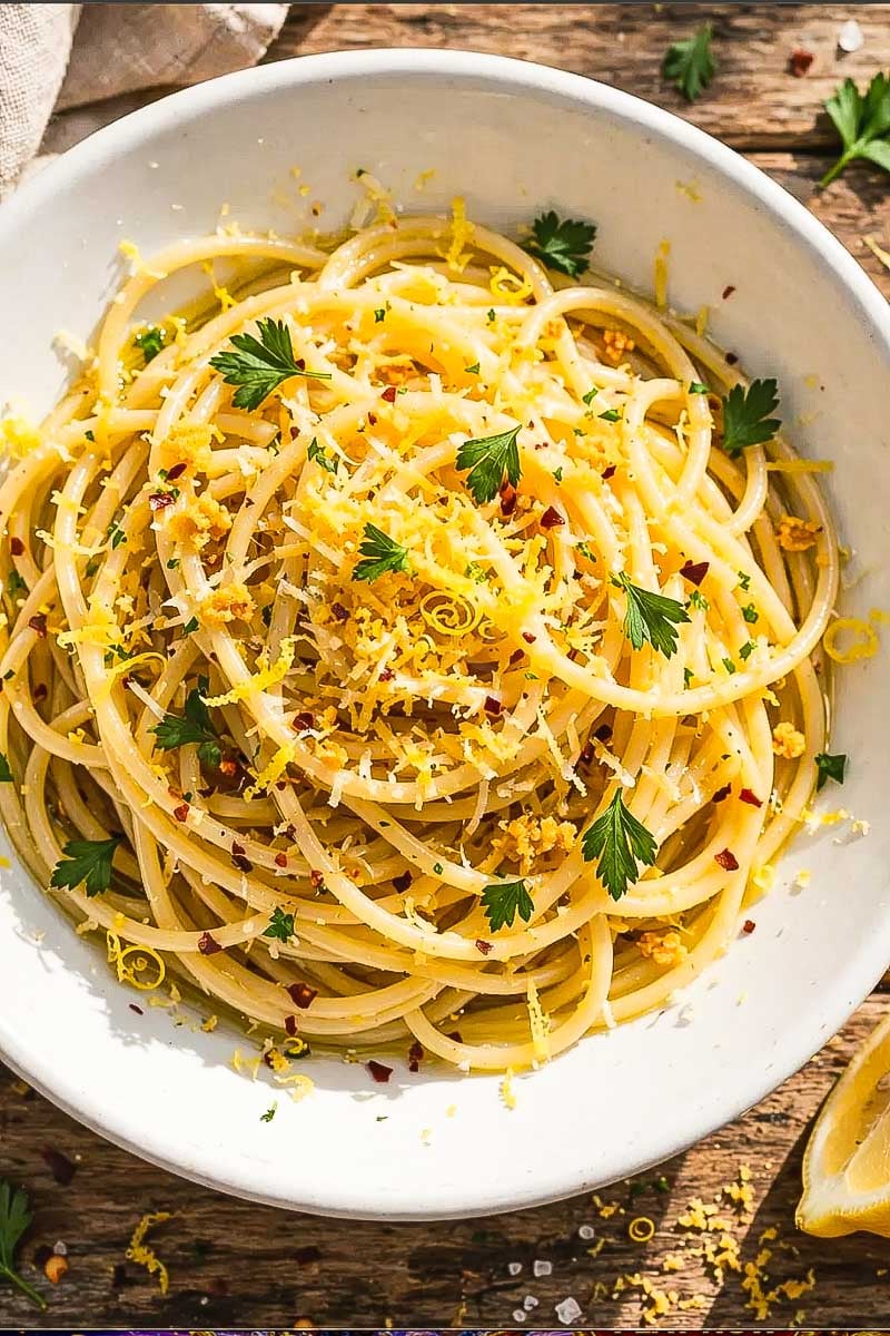 Authentic Spaghetti Bottarga Lemon served with freshly grated bottarga, lemon zest, parsley, and extra virgin olive oil.