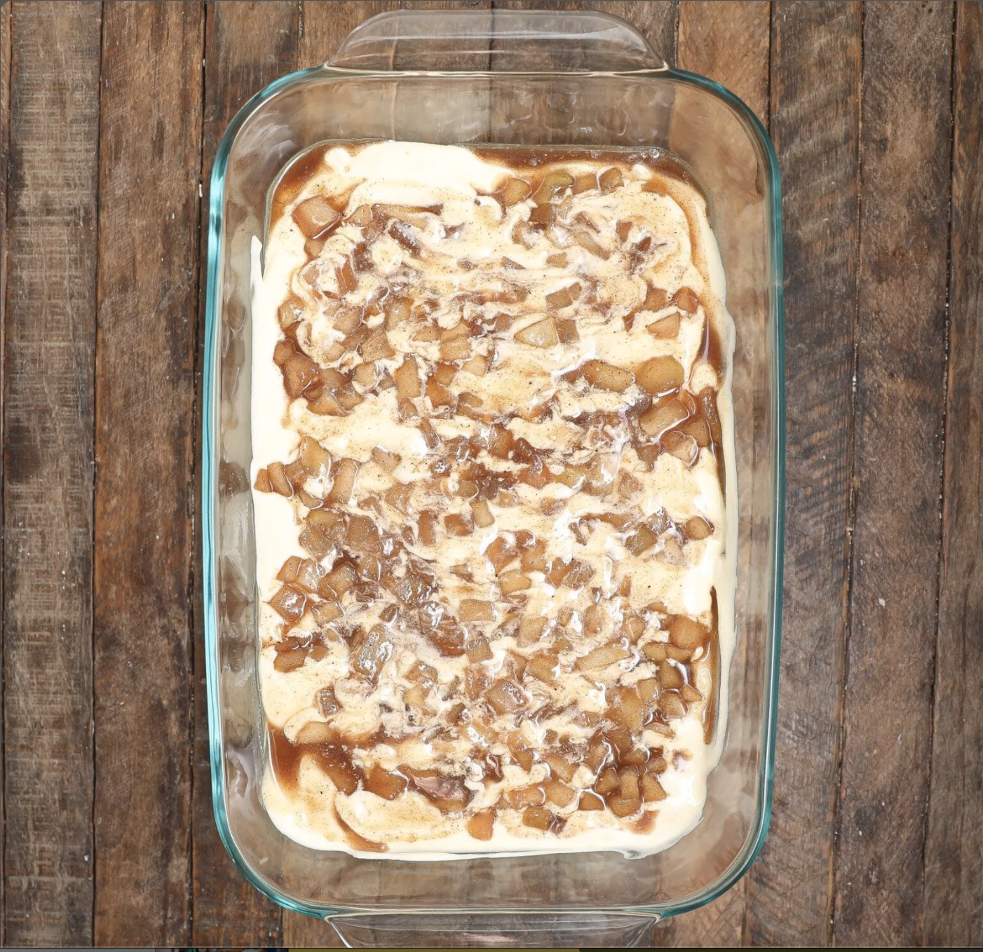 Chilled Caramel Apple Tiramisu finished with whipped topping, caramel sauce and chopped pecans.