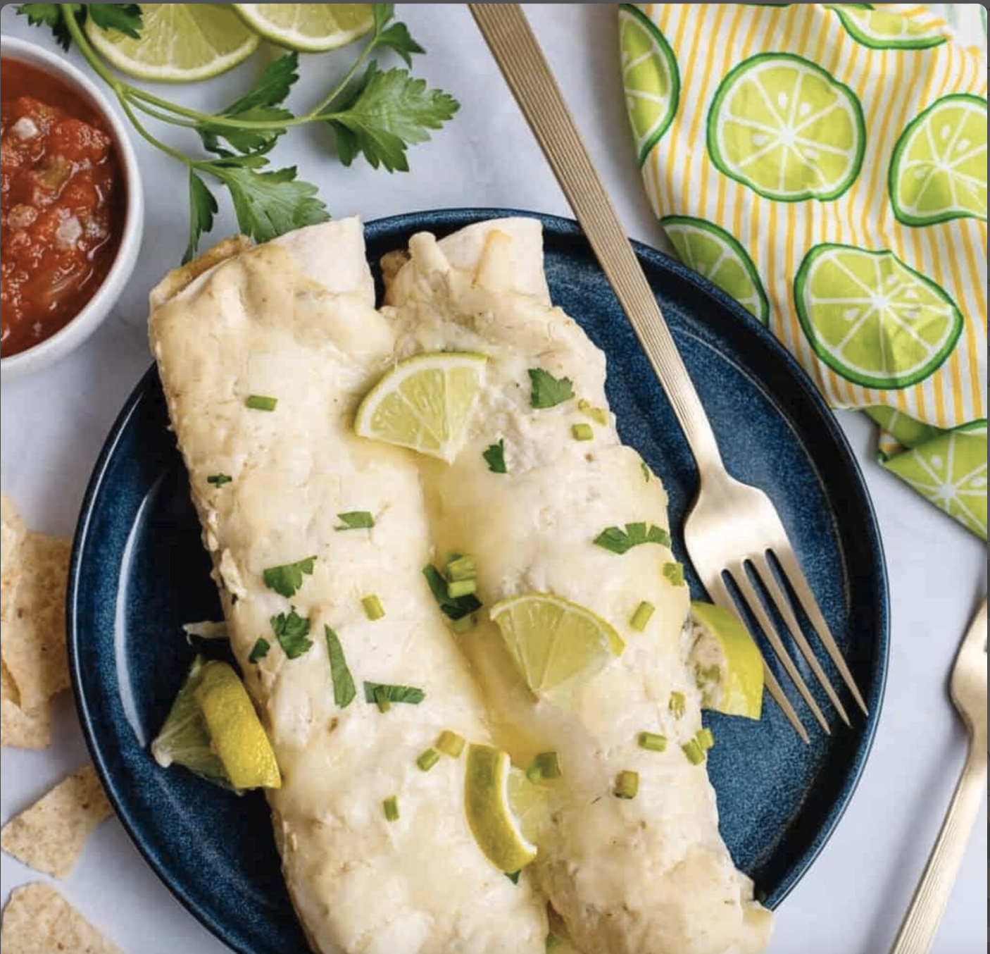 Creamy Honey Lime Chicken Enchiladas with Monterey Jack cheese and green enchilada sauce
