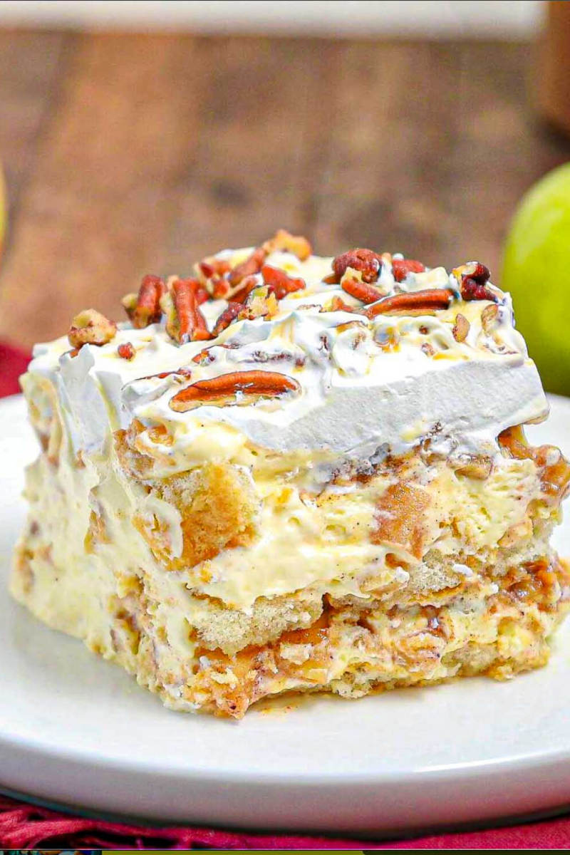 Caramel Apple Tiramisu layered with cinnamon-spiced apples, creamy mascarpone, caramel sauce and chopped pecans.