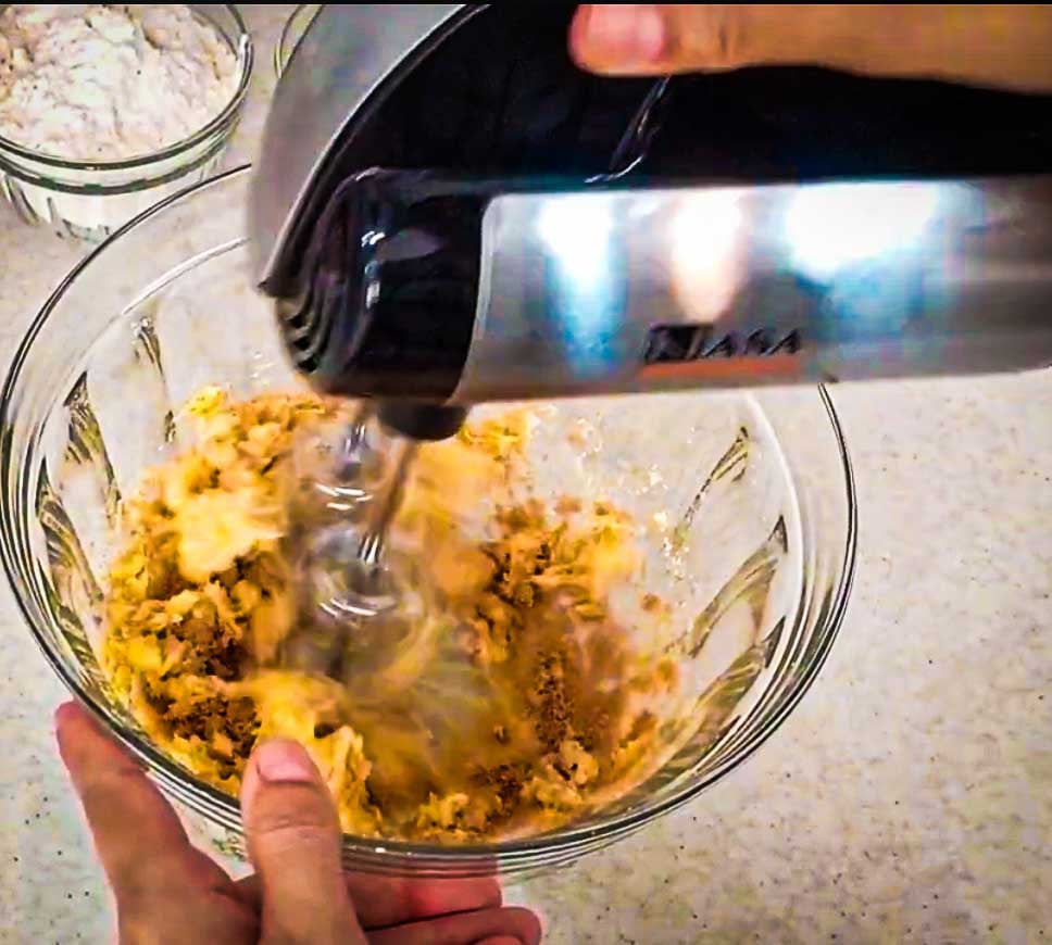 Butter and brown sugar beaten together until creamy for homemade baklava cookie dough.