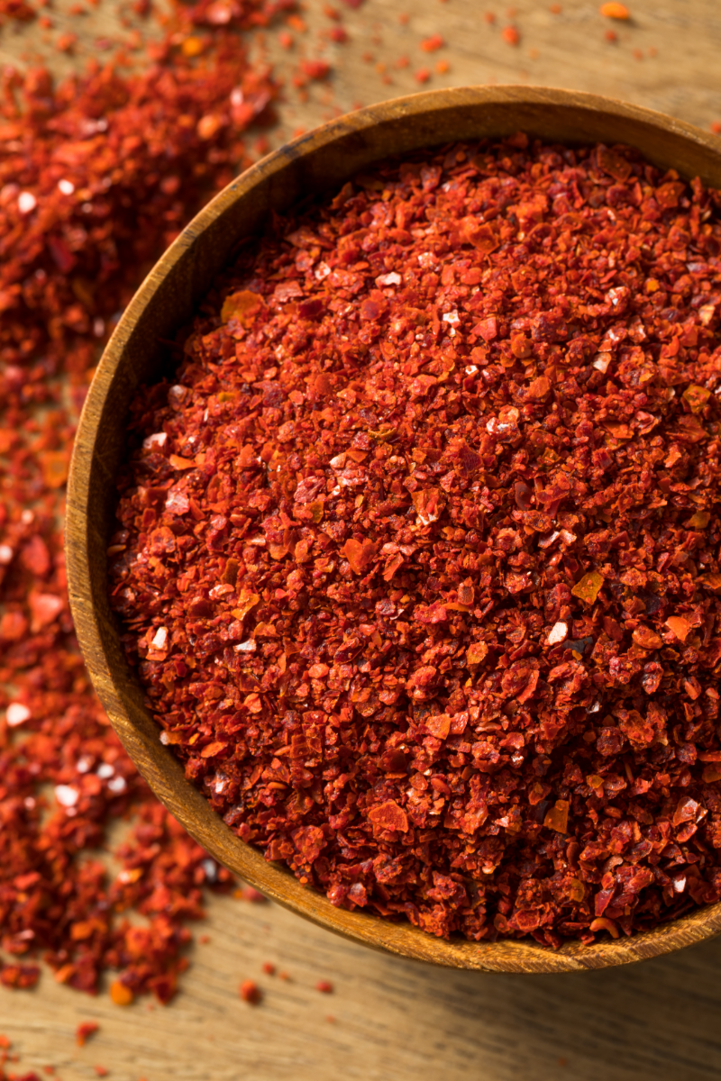 Korean gochugaru red pepper flakes used to make spicy homemade kimchi paste.