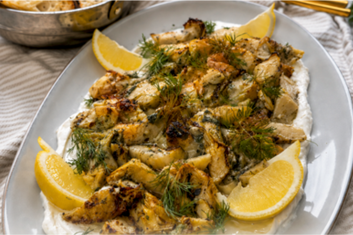 Chargrilled artichokes, goat cheese, Greek yogurt, garlic, fresh parsley, dill, lemon and baguette for the recipe