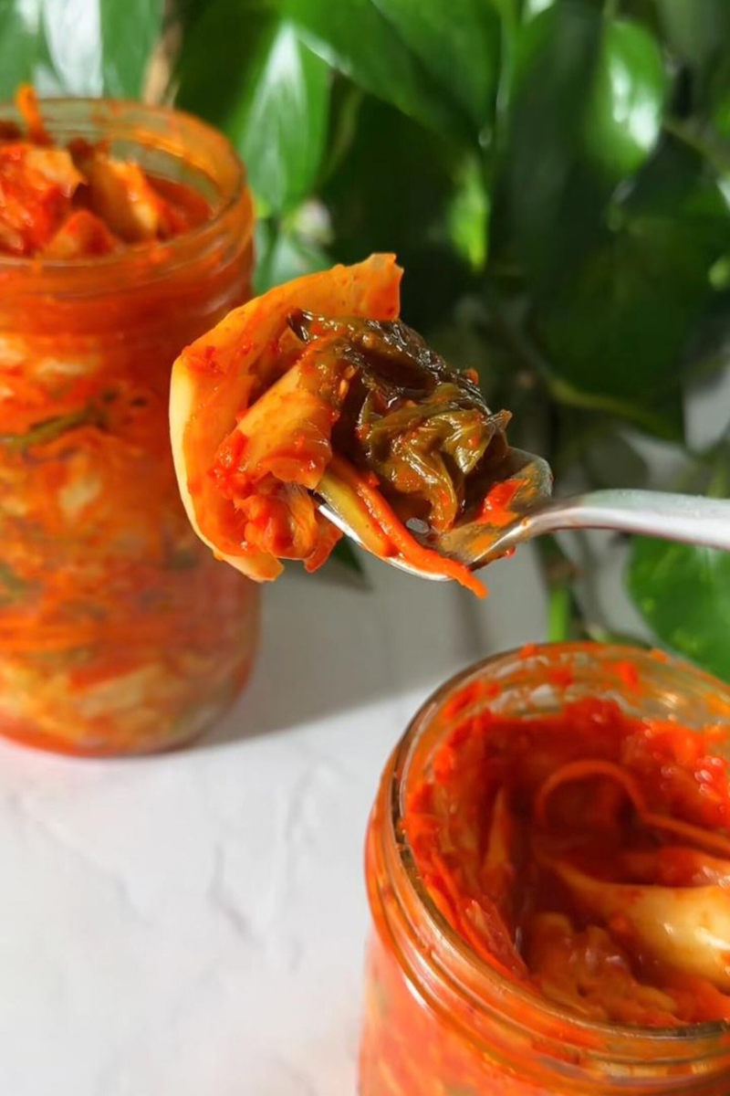 Easy homemade kimchi made with Napa cabbage, carrot, daikon radish and green onions.