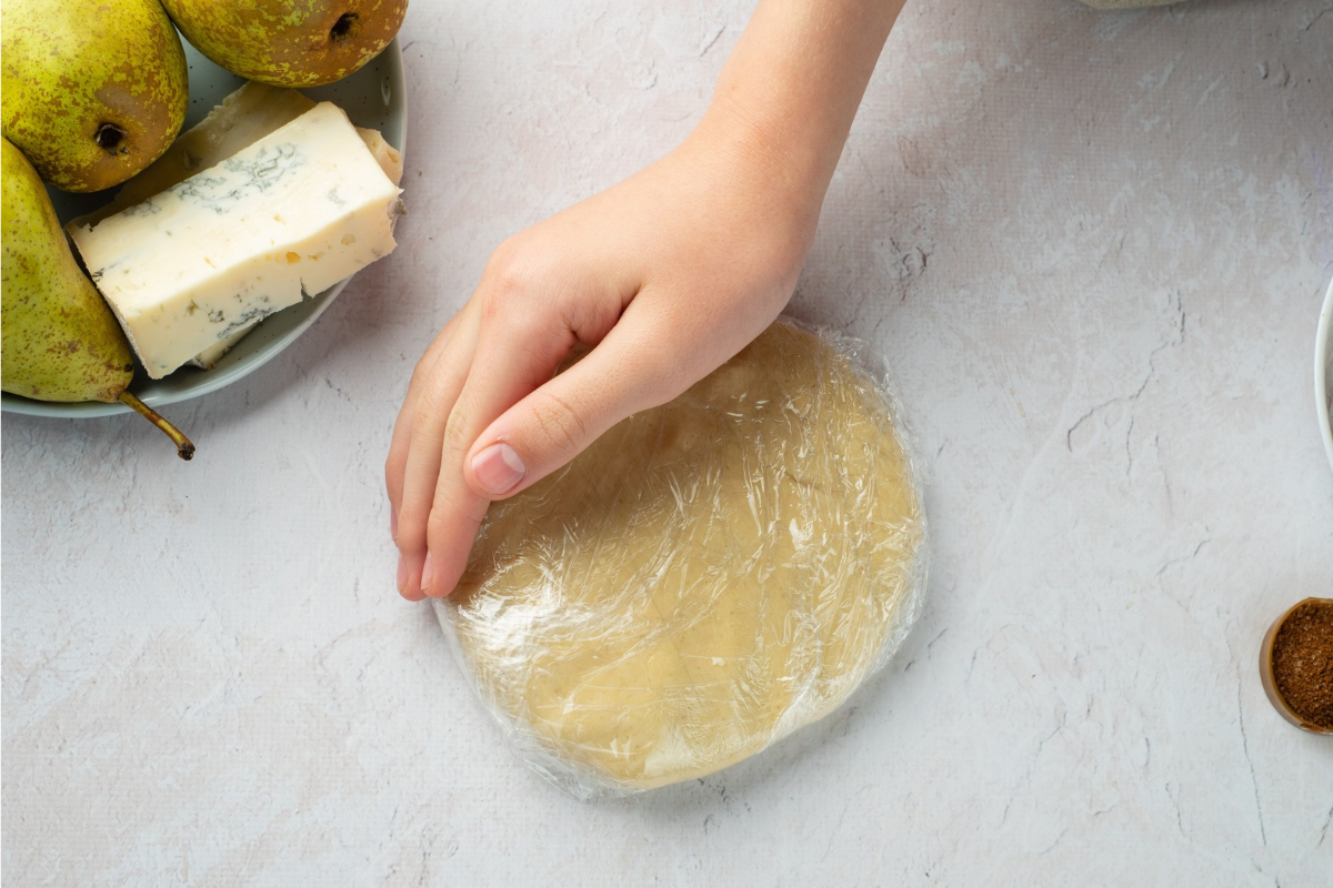 Wrap the dough as a disk and chill it for an hour. That rest makes it easier to roll and gives the butter time to firm up again.