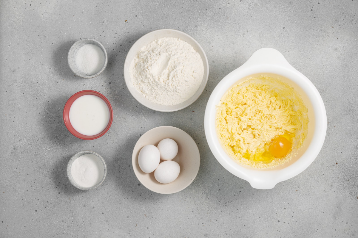 Whole egg added to creamed butter and sugar mixture while preparing marble Bundt cake batter